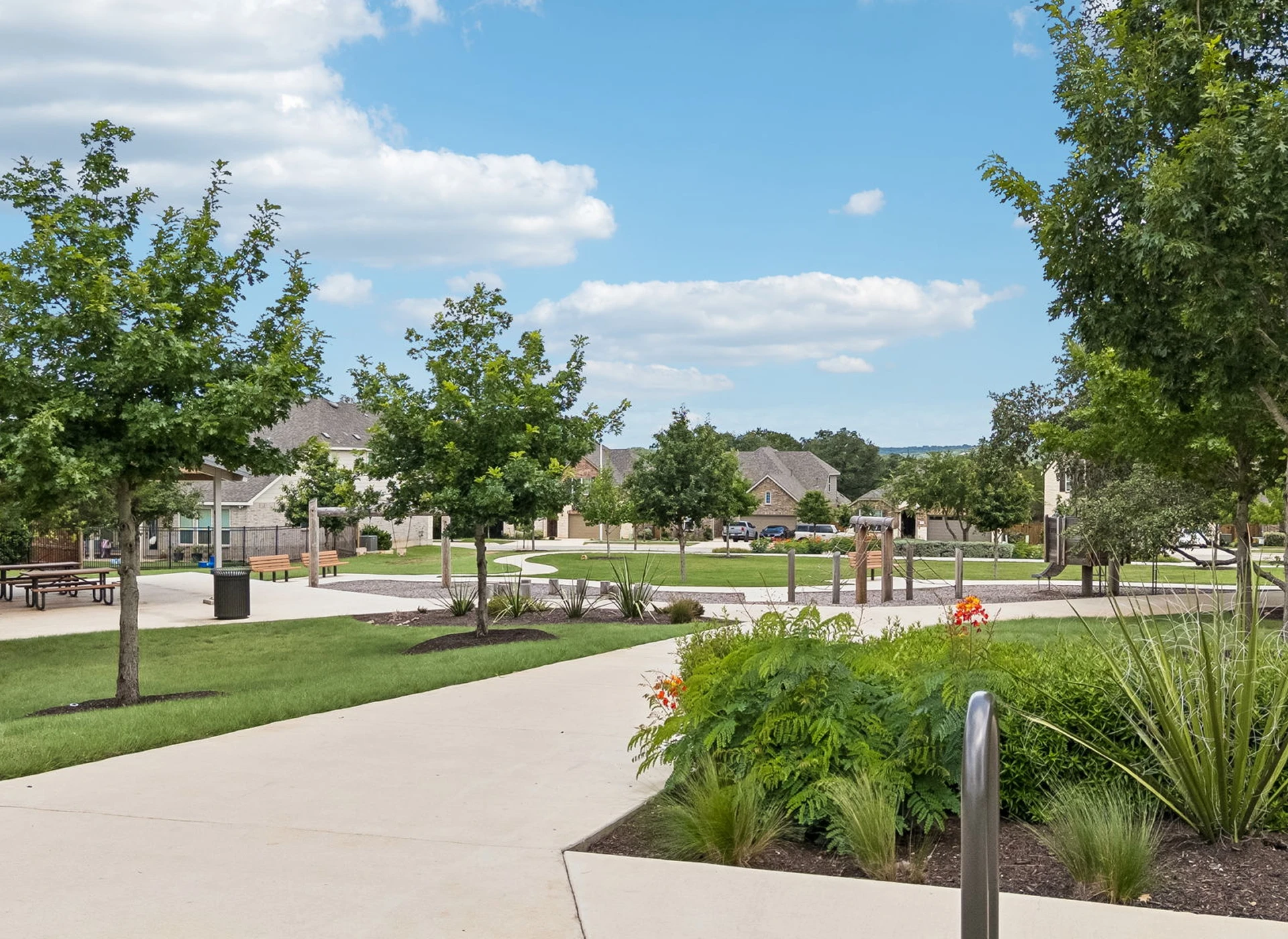 Community park with walkways and greenery.