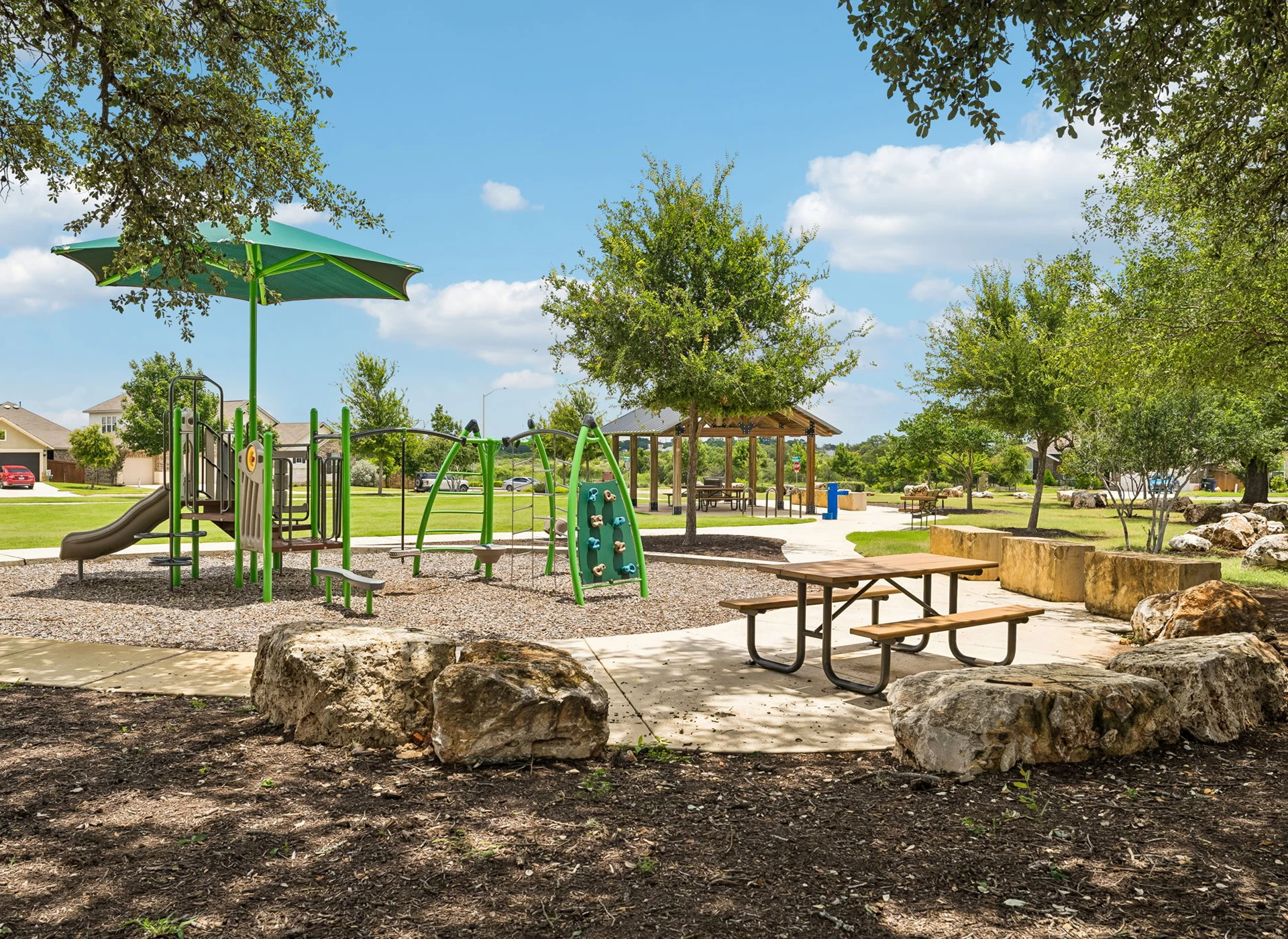 Playground with slide and picnic table.