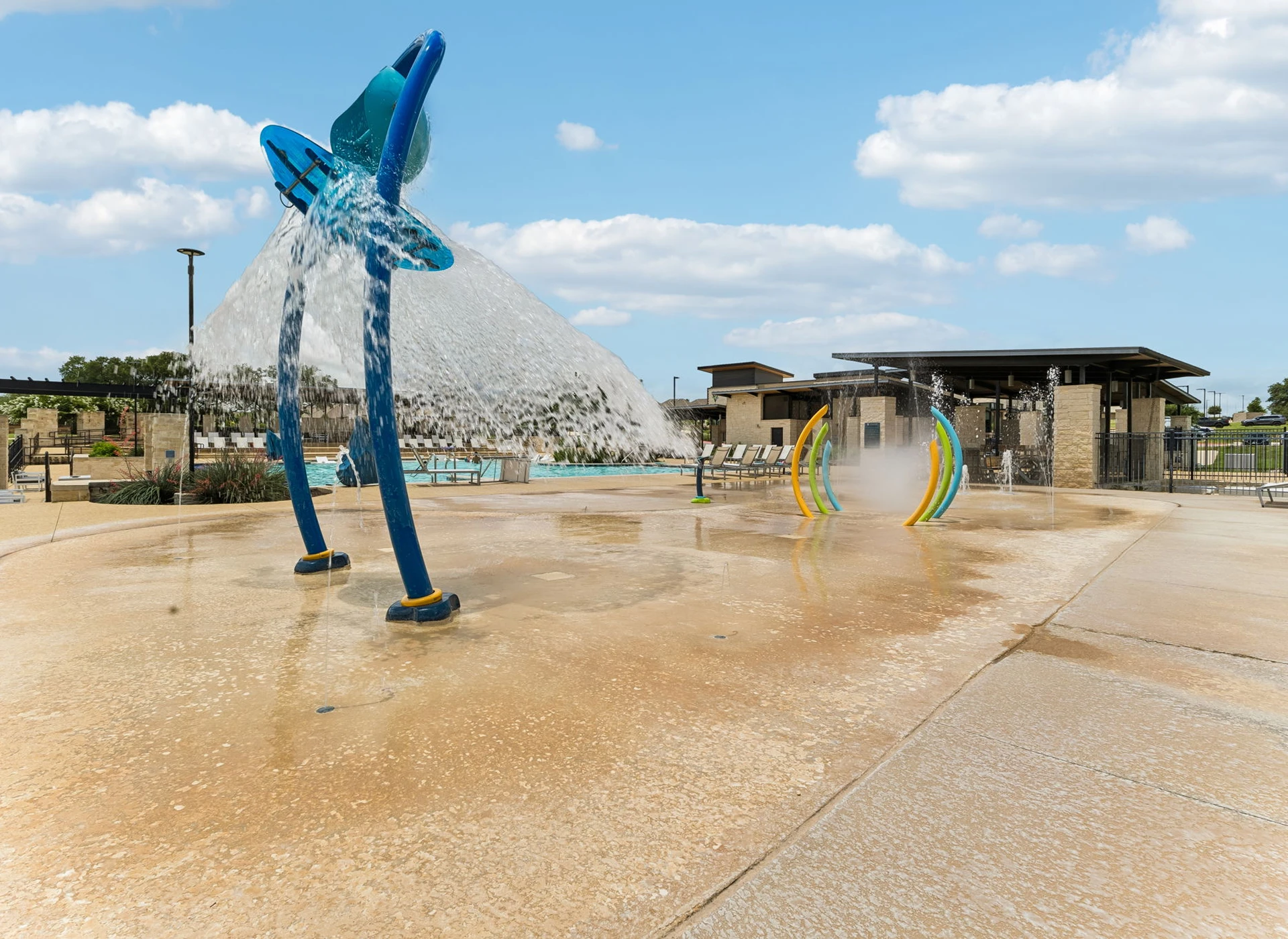 Children's splash pad with water features.